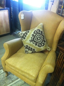 This one has the perfect shape, a great neutral, and a bargain at $299. But it's upholstered in burlap, and mom says that wont hold up to her wear and tear.